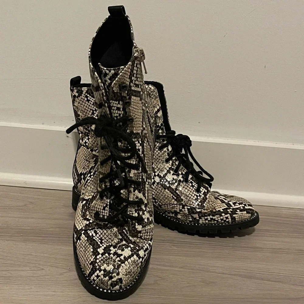 Express snakeskin combat booties. Rhinestone embellishing around sole. - Picture 2 of 10